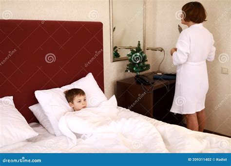 mom and son in a hotel